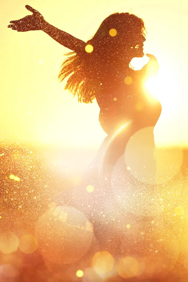 Brain-Mapping-Treatment A woman with outstretched arms in the sunset. Get brain mapping treatment from Frank Lanzisera, D.C. in Tampa Bay Metro.