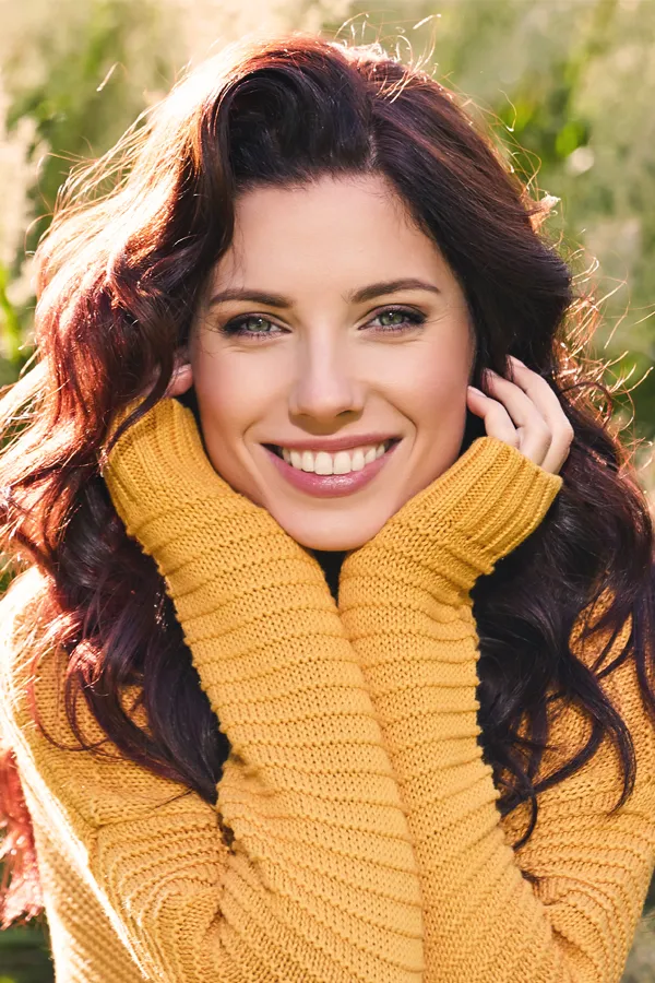 IV-Therapy-for-Skin-Health-Treatment A woman with long brown hair and beautiful skin. Get IV Therapy for skin health from Frank Lanzisera, D.C. in Tampa Bay Metro.
